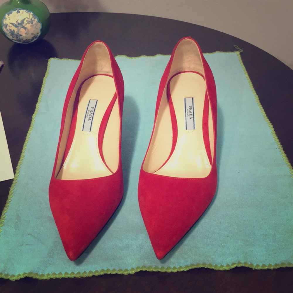 Red suede Prada pumps